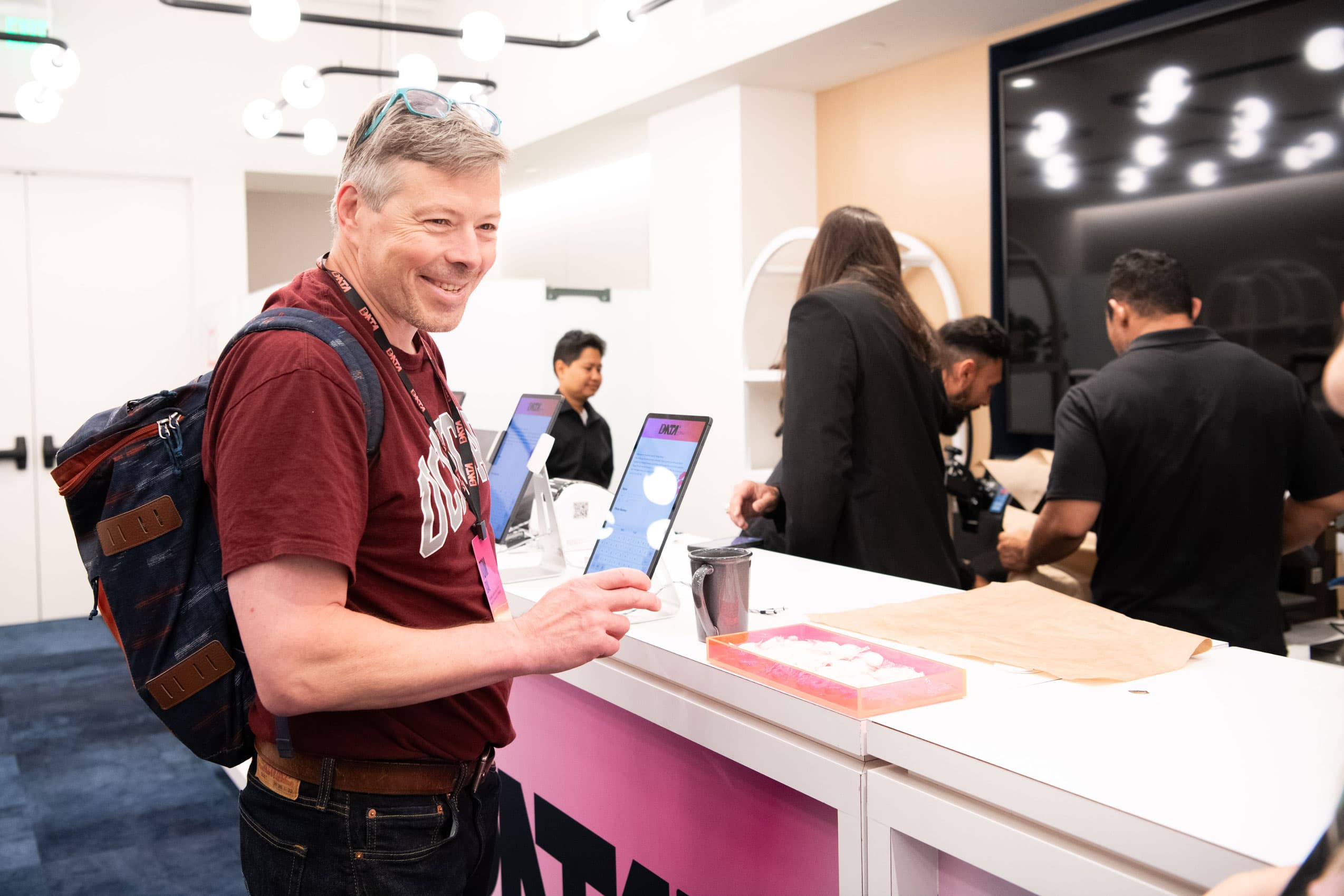 Visitor browsing exclusive items at the swag shop at Small Data event 2024