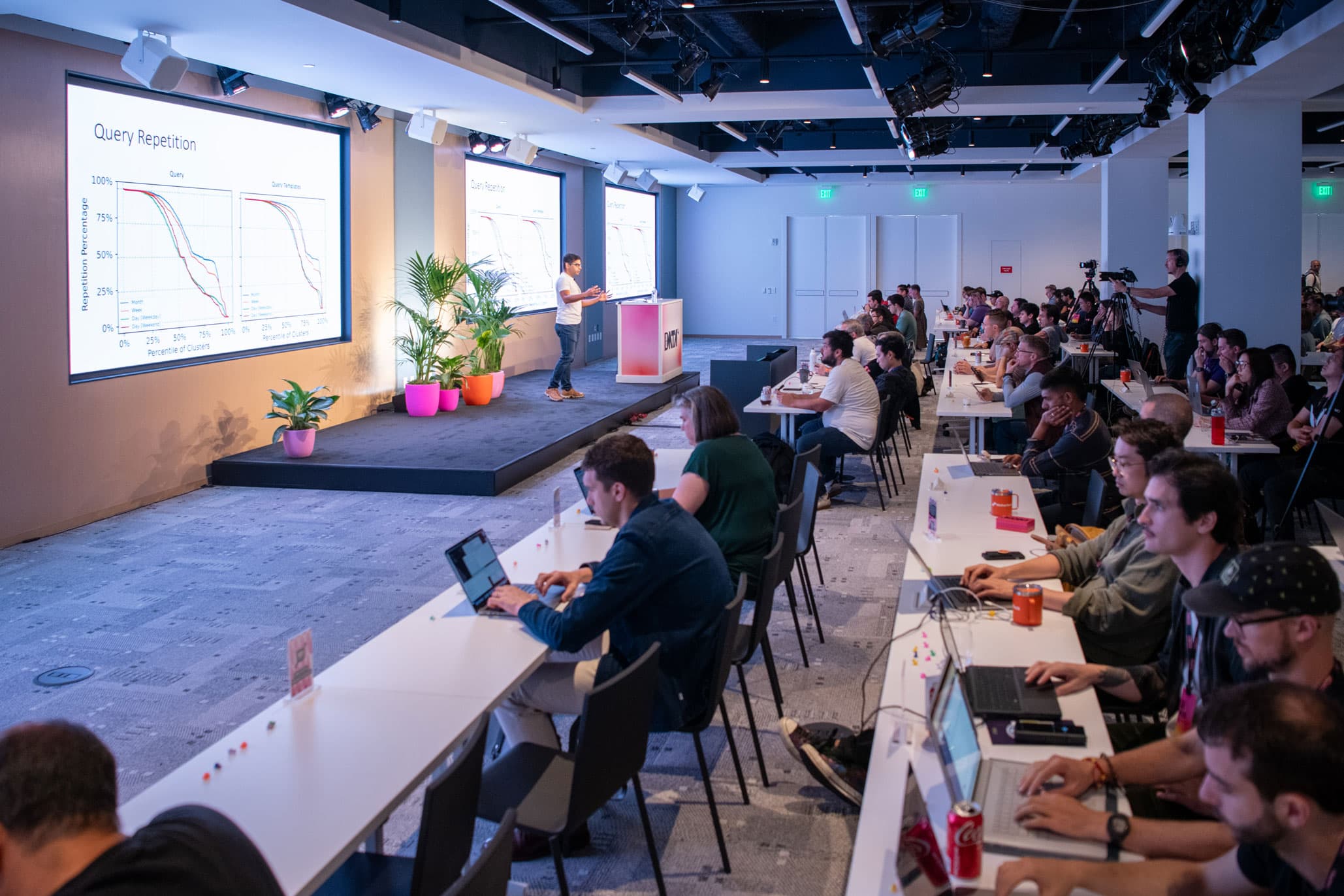 Engaged attendees asking questions about query repetition techniques at the Small Data event 2024